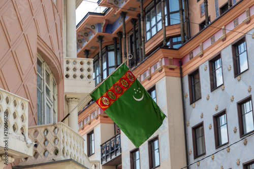 Canvas Print National flag of Turkmenistan waving on the balcony of the Embassy of Turkmenist