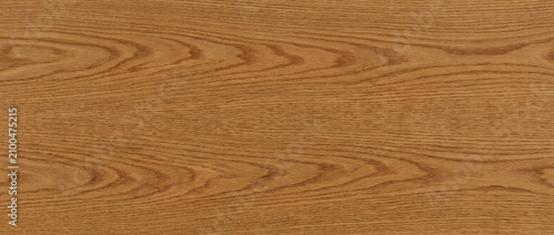Obraz na płótnie Wood texture background showing russet oak grain with vivid cathedral pattern fo