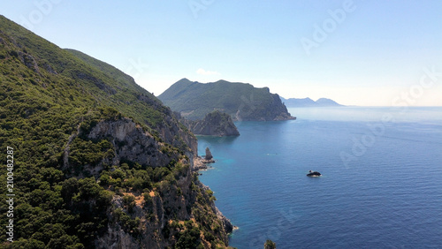 Cuadro en lienzo Aerial view of the wild Gyali beach in Corfu, Greece, with dramatic high cliffs and crystal clear turquoise sea