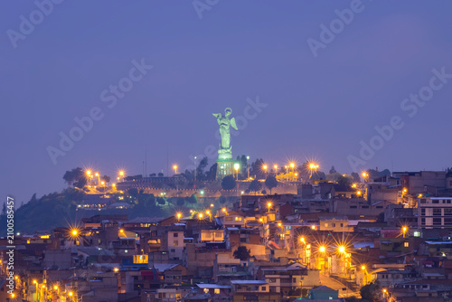 Statue of the Virgin of El Panecillo at dawn in Quito, Ecuador
