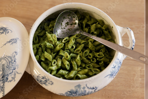 Принти на полотні Penne pasta with homemade pesto sauce served in a traditional ceramic tureen