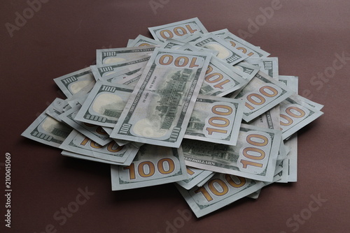 Konstfotografi A Stack of One Hundred Dollar Bills Isolated on a Dark Background as a Symbol of