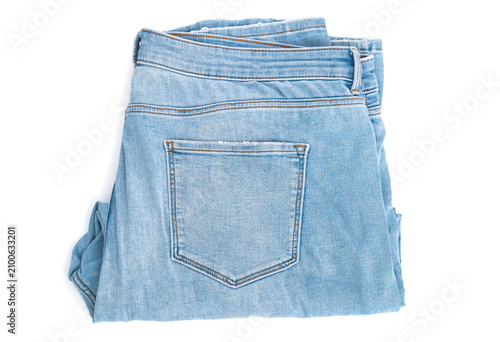 Blue jeans denim trousers close up isolated on white background