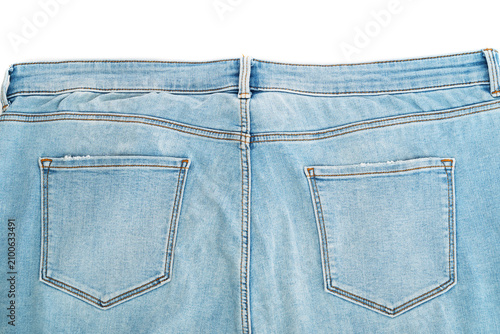 Pockets on blue jeans denim trousers close up