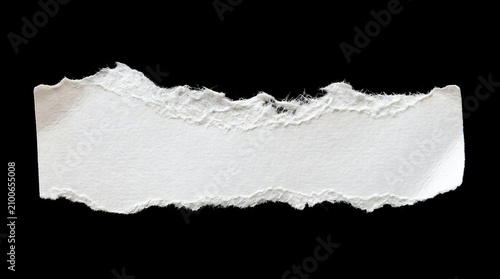 Ripped white paper fragment isolated on black background