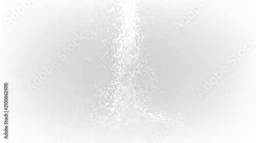 Water spray rising from a surface on a transparent background captured during a sunny day in an outdoor setting