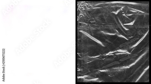 Foto Crumpled plastic wrap texture on black background, wrinkled transparent cellopha