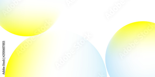 Fotografija Three translucent spheres with a soft gradient of yellow and blue, appearing to float against a white background