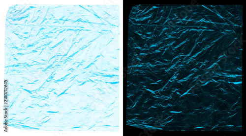 Tableau sur toile Crumpled plastic wrap texture, light blue transparent cellophane film, wrinkled
