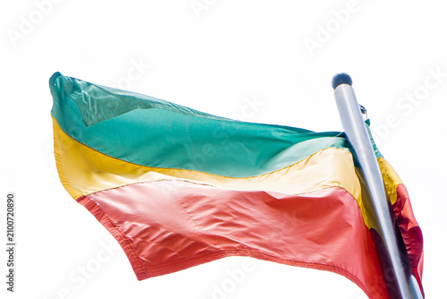 Canvastavla Flag of the town of Caldas, Antioquia, waving in a cloudy blue sky