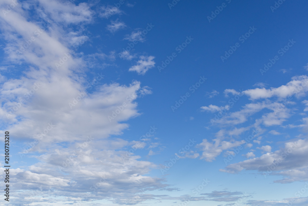 Naklejka premium Blue Sky With Scattered Clouds Over the Strait of Georgia, British Columbia, Canada