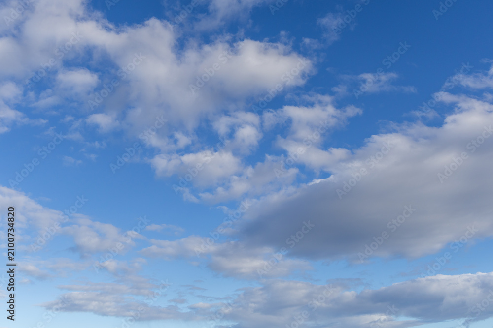 Obraz premium Soft Blue Sky With Fluffy White Clouds Cloudscape Over Calm Daylight Horizon