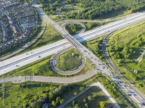 Billede på lærred Aerial view of a highway interchange at sunset - Vue aérienne d'un échangeur aut