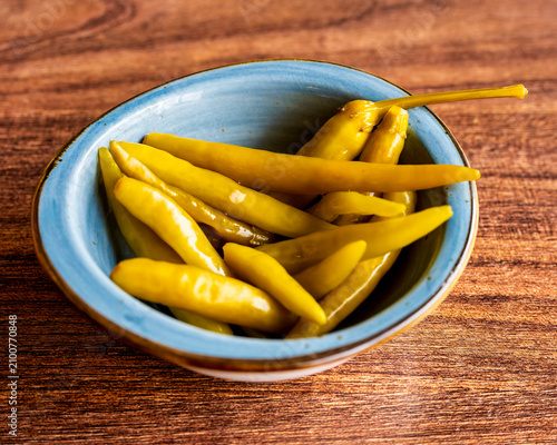 Pickled Green Chili Peppers In Ceramic Bowl