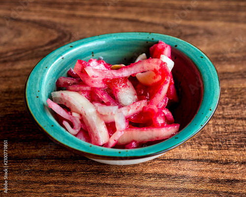 Pickled Onions With Cherry Sauce In Bowl