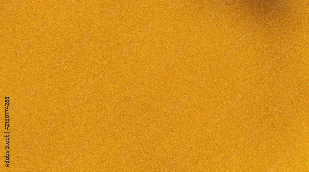 Naklejka premium Golden yellow fine grain texture surface, subtle noise pattern across smooth luminous backdrop with warm glowing light effect