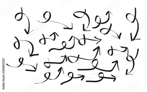 Set of hand drawn black marker arrows in various artistic shapes and directions for design projects