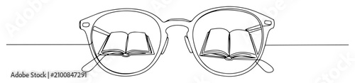 Photos Glasses with books in lenses outline concept