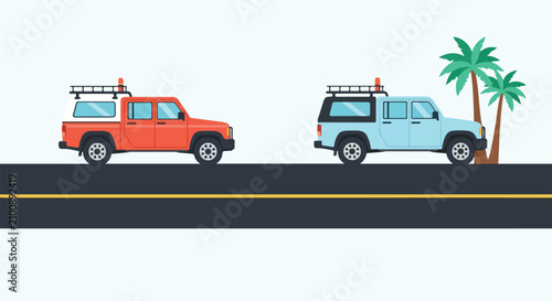 Two off-road pickup trucks with camper shells, one orange and one blue, are shown on a dark asphalt road with two green palm trees.