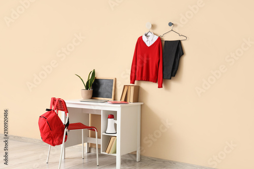 School uniform with red swe...
