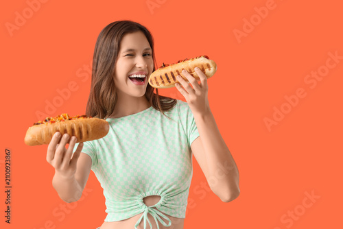 Young woman with tasty hot ...