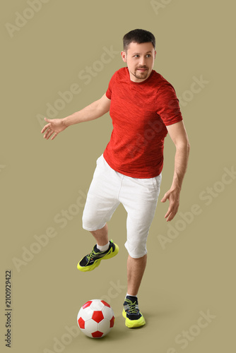 Man playing with soccer bal...