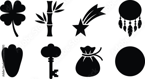 Luck and prosperity symbol silhouette collection featuring clover, bamboo, dreamcatcher, paw print, and coin icons for design projects