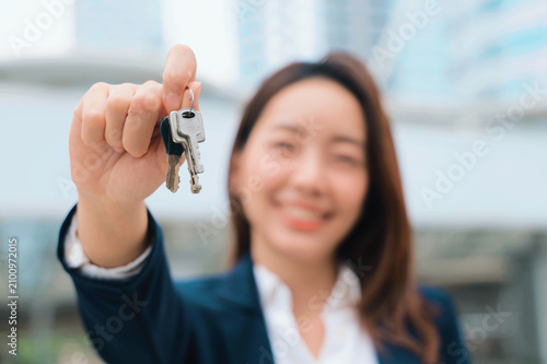 Close-up of keys symbolizing home ownership, property purchase, successful investment, and real estate services with copy space