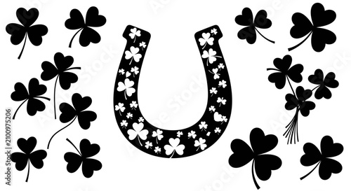 Schilderij op canvas Lucky horseshoe with horseshoe adorned shamrocks surrounded additional shamrocks