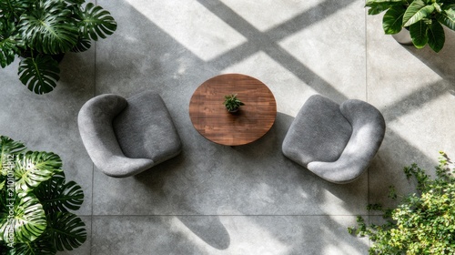 Top view of modern lounge chairs and wooden table.