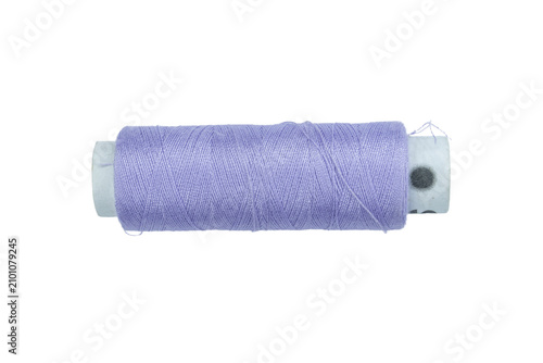 One spool of purple thread for embroidery and craft projects on a transparent background.