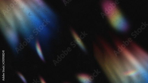 Konstfotografi Soft blurred colorful chromatic prism light leaks and lens flares on a dark grainy textured background