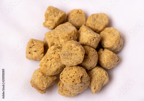 Картината върху платно Raw soya chunks on white background