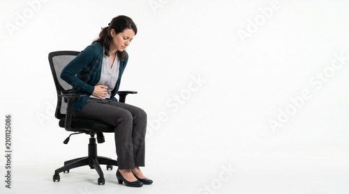 Businessman suffering from stomach ache