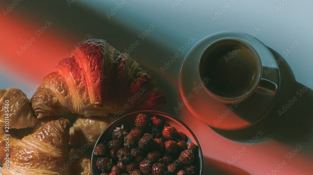 Obraz premium Flat lay of pastries and coffee on a blue surface with copy space for cafe breakfast menu, food editorial branding and bakery morning lifestyle advertisement