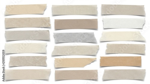 Assorted ripped pieces of colored paper in various shades on white background