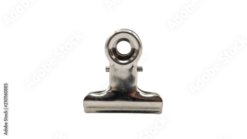 A metallic silver binder clip centered against a background, of horizontal glitch, lines in yellow, red, white, and, grey color bands