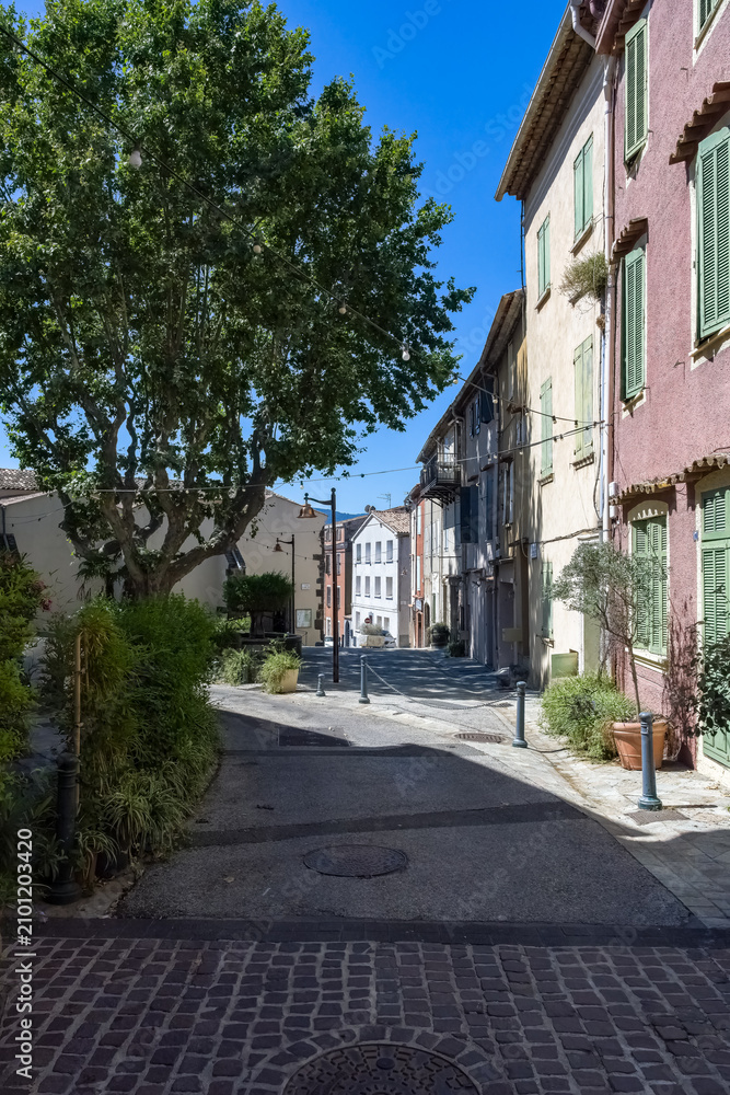 Fototapeta premium Cogolin, typical village in the Var, colorful houses in the historic center 