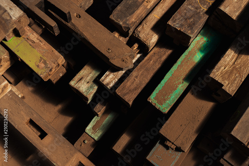 Bilde på lerret Abstract background of weathered salvaged timber pieces in a workshop
