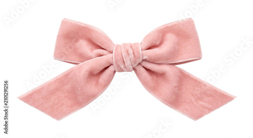Obraz na płótnie Soft pink velvet bow with elegant knot and flowing tails