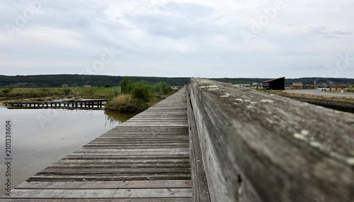 Canvas Print Low Angle of Wooden Boardwalk in Secovlje Salina Nature Park