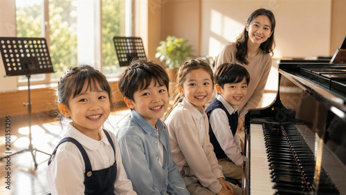 Smiling Children with Piano Teacher in Bright Music Classroom