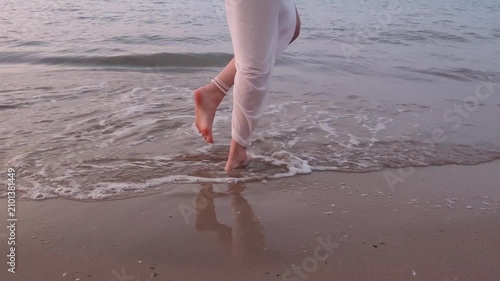 feet dancing on the shore