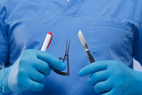 Surgeon Preparing for Blepharoplasty with Surgical Tools