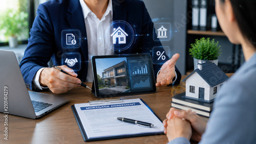 Mortgage loan realty contract advisor client tablet digital consultation during home purchase meeting, paperwork on desk, finance icon, modern office negotiation