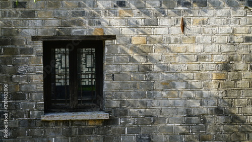Stone walls and wooden doors of traditional Chinese houses