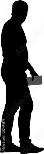 Black silhouette of a standing or walking man isolated on white background.