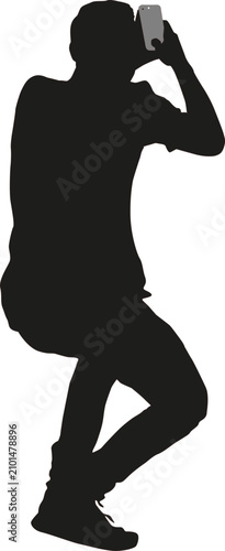 Black silhouette of a man taking a photo with a smartphone isolated on a white background, standing and using a mobile phone camera