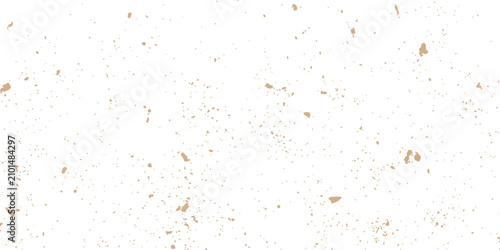 Fotografi Abstract flecks of gold paint scattered across a clean white background during a