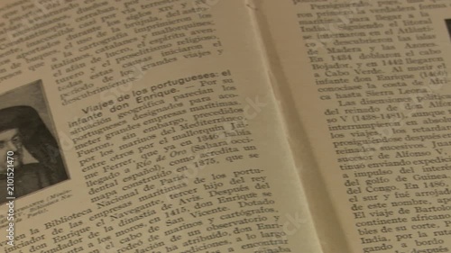Bilbao, españa - 17/07/2023: close-up dolly shot of old history schoolbook pages